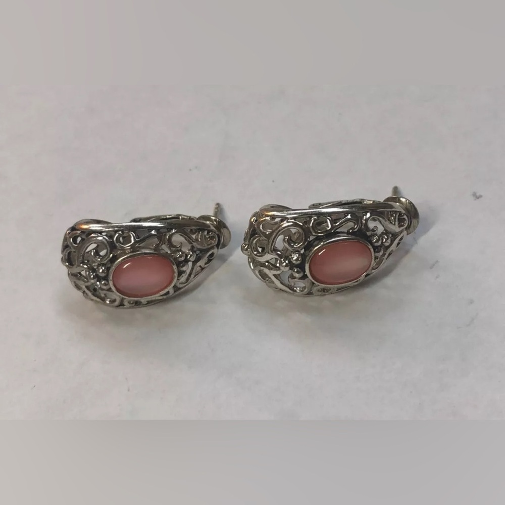 ESterling Silver earrings with pink stones.